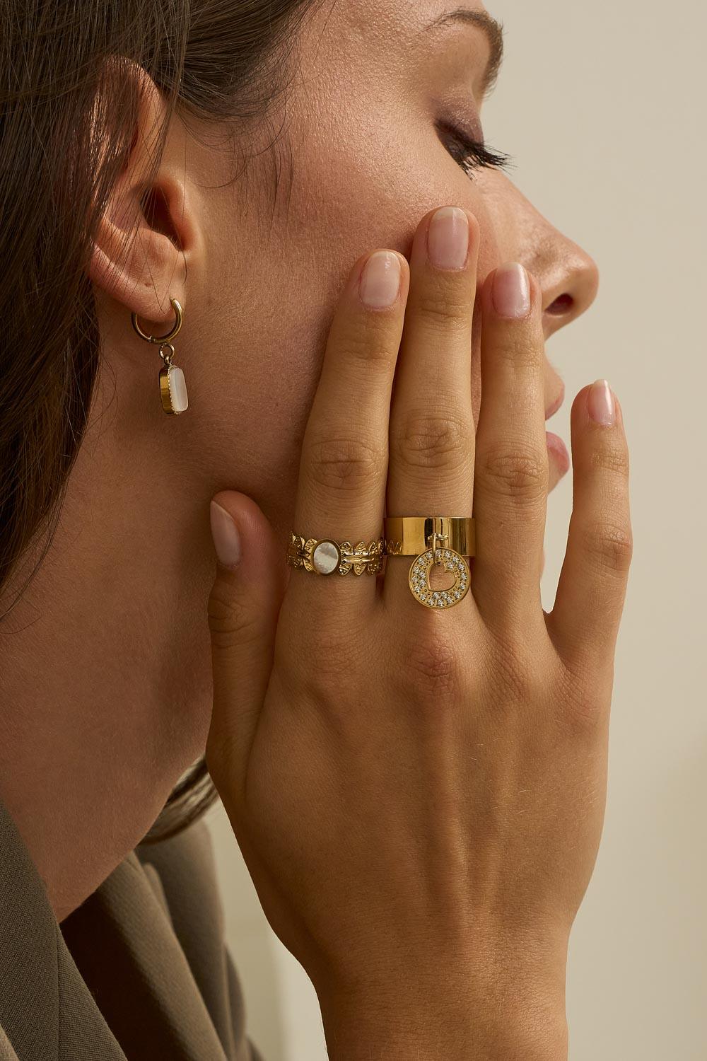 BAGUE ARGENTÉE EFFET MARTELÉE AVEC PENDENTIF COEUR AJOURÉ